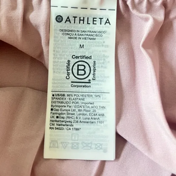ATHLETA Color Block Swing Foward Pleated High Low Midi Athletic Skirt