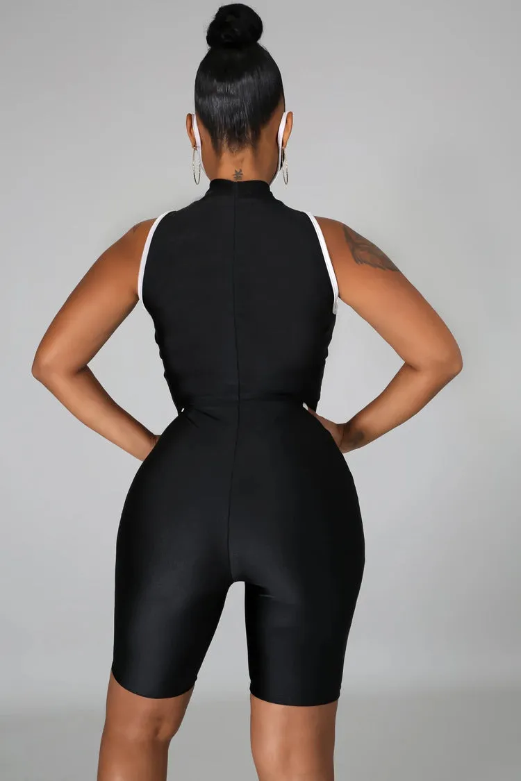 Bold Mesh Cutout Patchwork Biker-Style Jumpsuit with Striking Striped Details