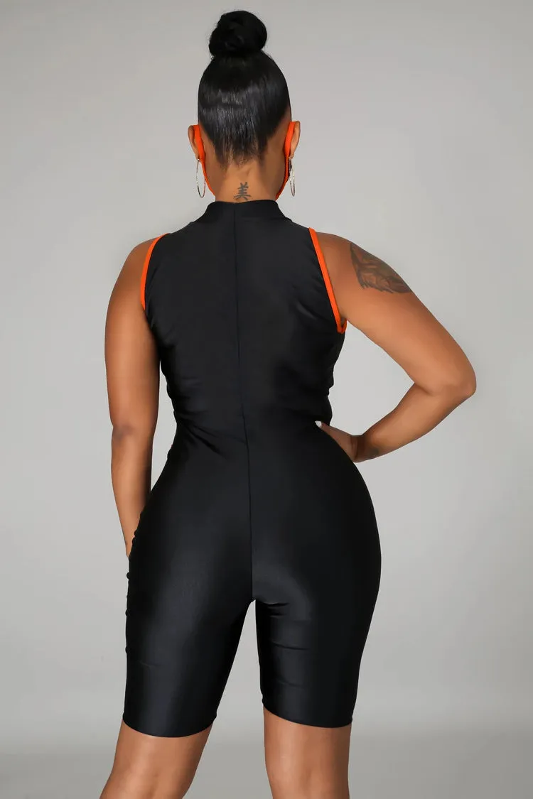 Bold Mesh Cutout Patchwork Biker-Style Jumpsuit with Striking Striped Details