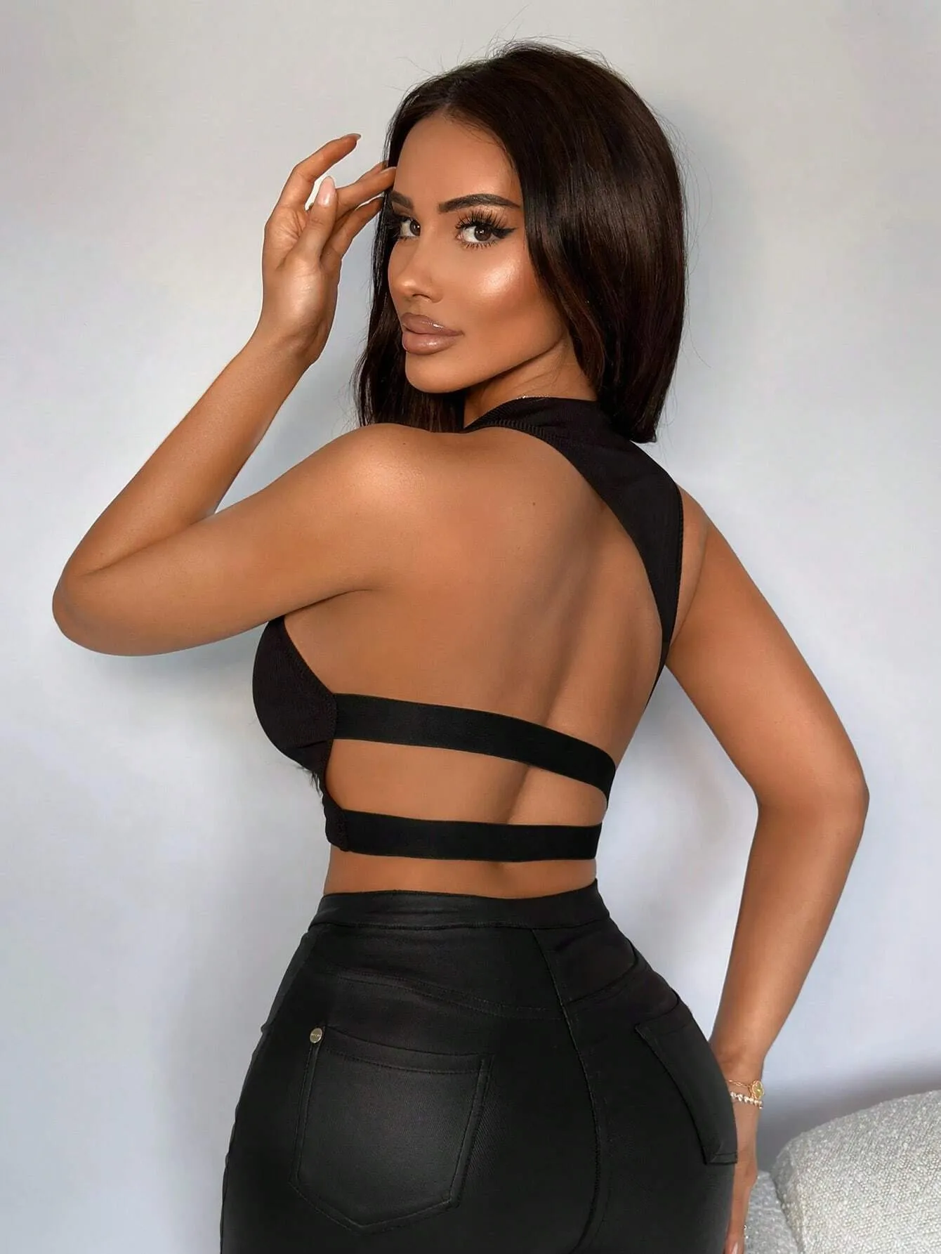 Sleek Ribbed Halter Crop Tank with Backless Hollow Design
